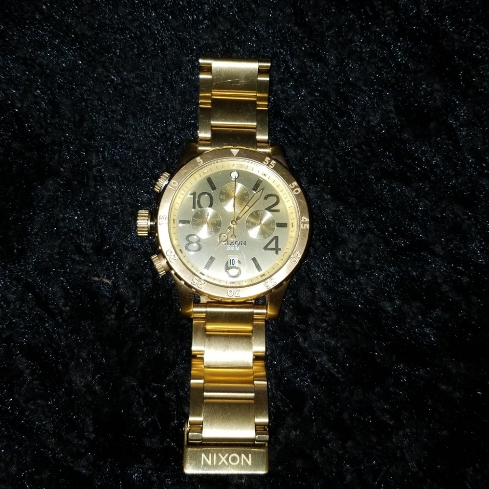 Mens gold Nixon 48-20